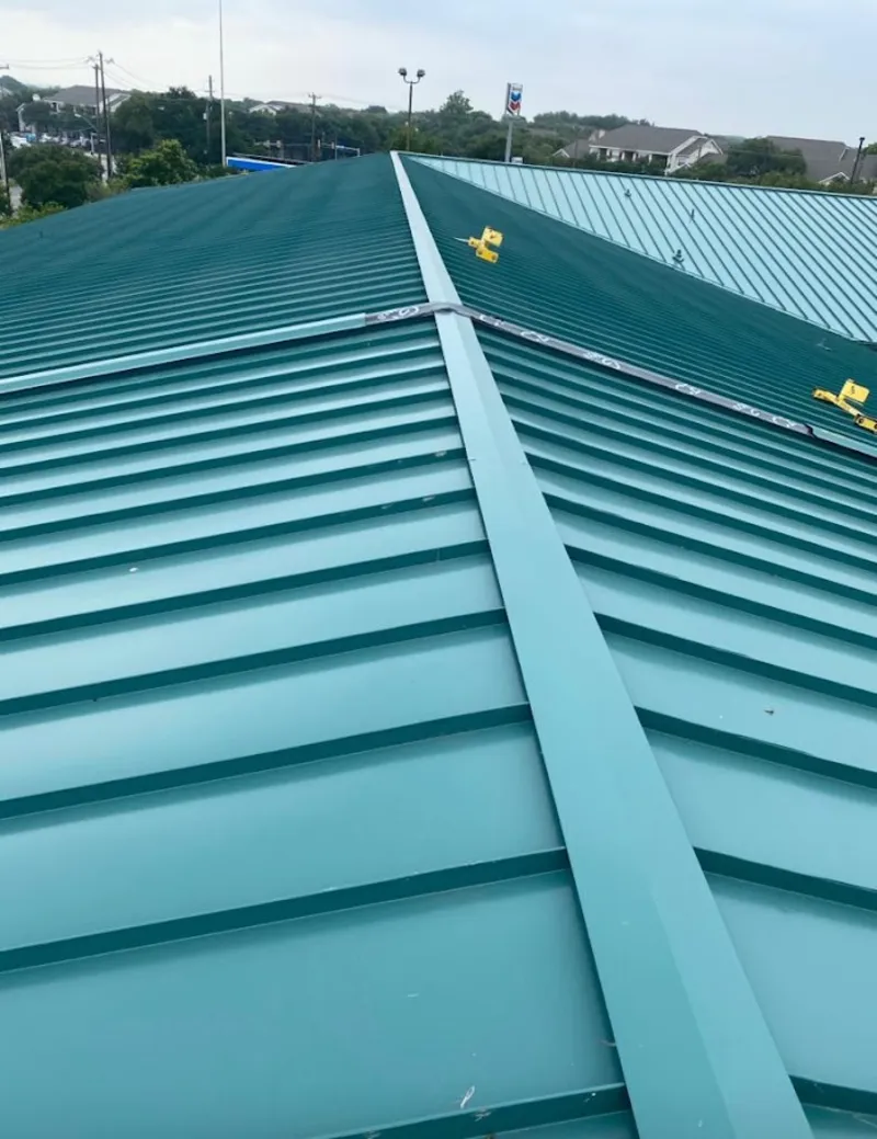 Green commercial metal roof ridge and valley for Metal Roof Repair in Port Salerno